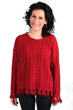 DISTRESSED CABLE KNIT SWEATER