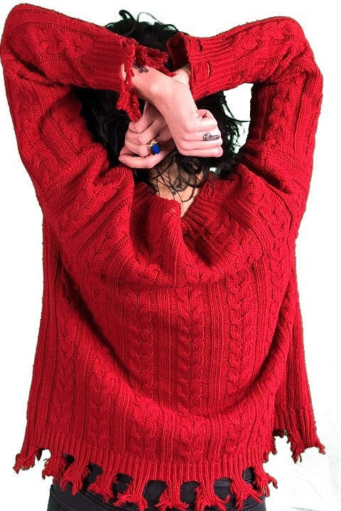 DISTRESSED CABLE KNIT SWEATER